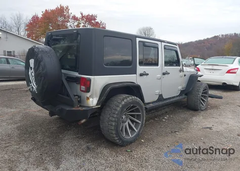 2009 Jeep Wrangler Unlimited Sahara z USA, uszkodzony, nr VIN 1J4GA59119L764823
